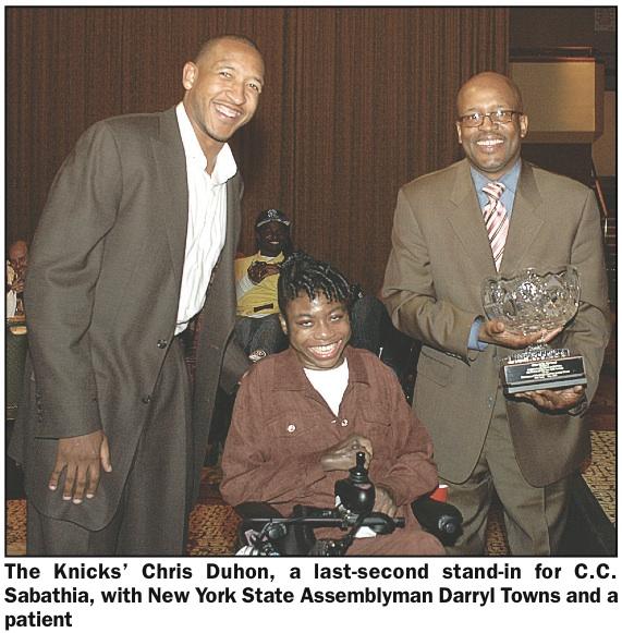 Pro stars Justin Tuck, Chris Duhon aid Wheelchair Charities (36142)