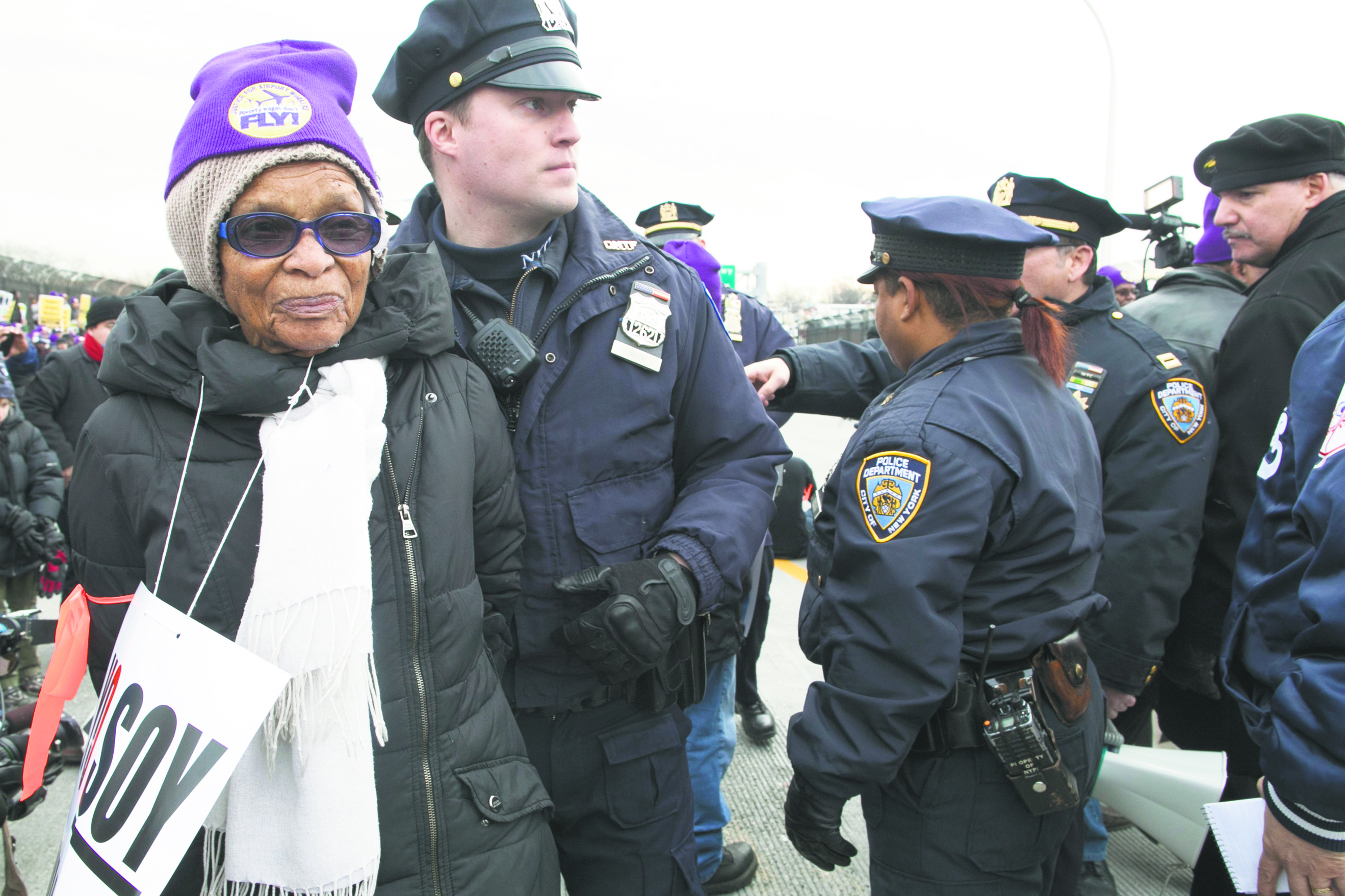 Airport workers and supporters arrested at MLK day protests (57422)