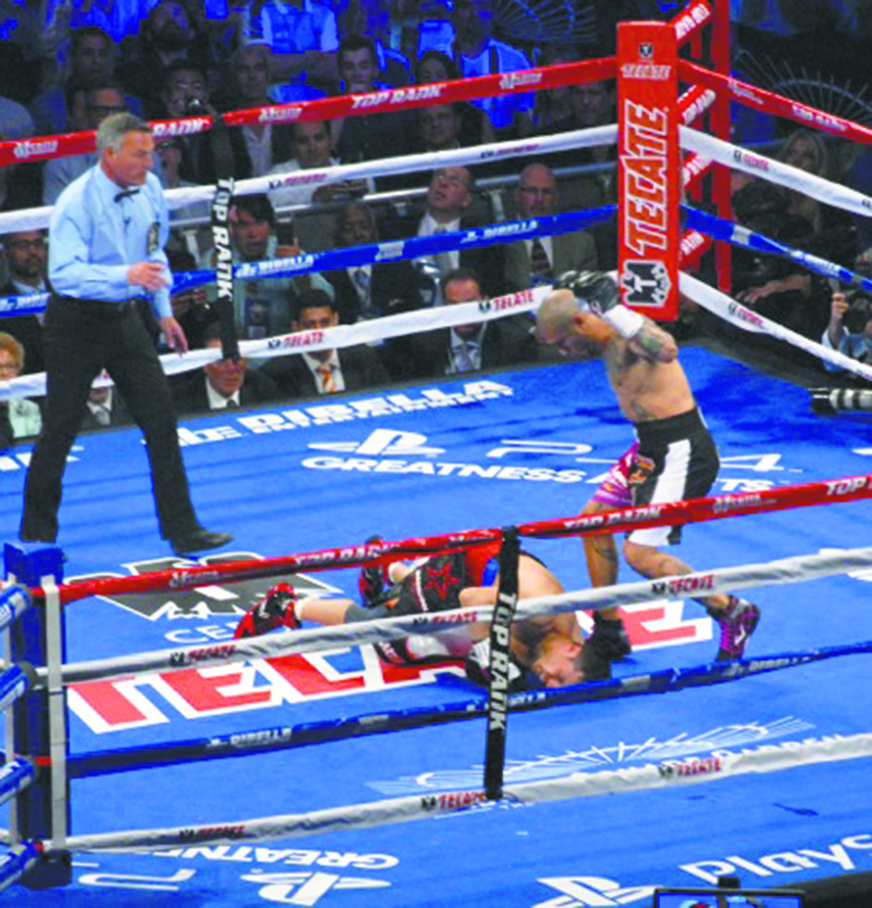 Cotto knocked a stretched-out Martinez to the canvas. (77700)