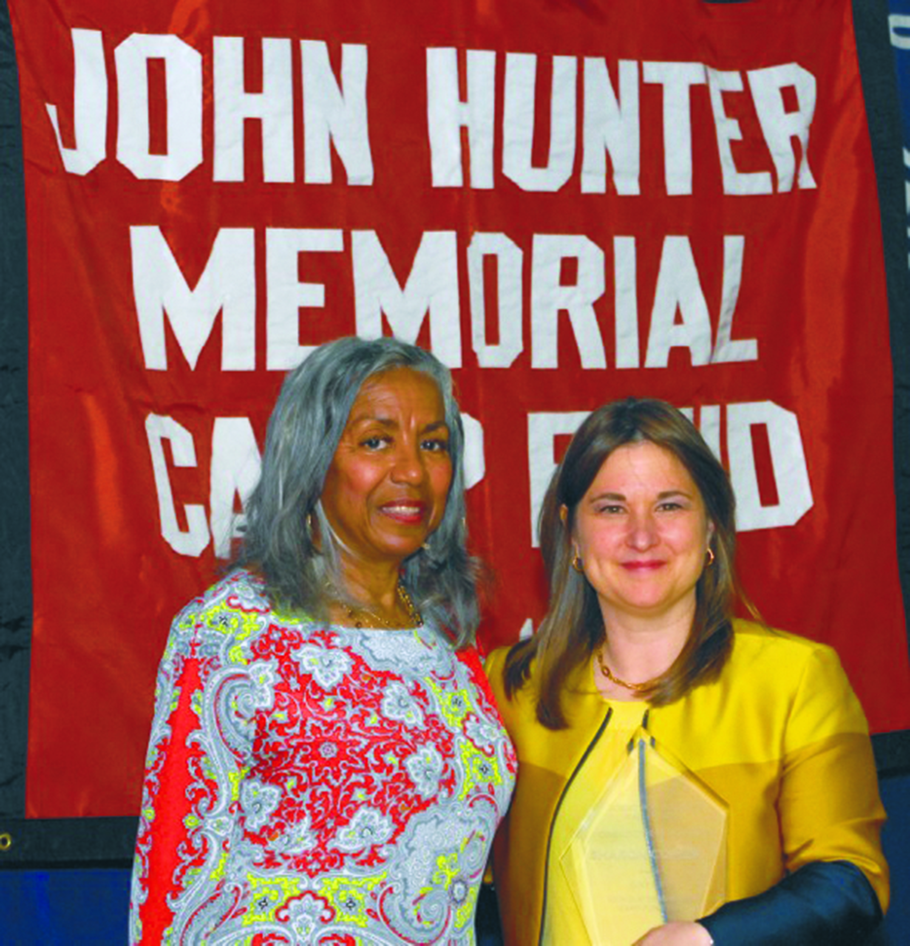 Sharon Cohen receiving the John Hunter Community Service Award from the John Hunter’s Lolita Lowe. (76752)