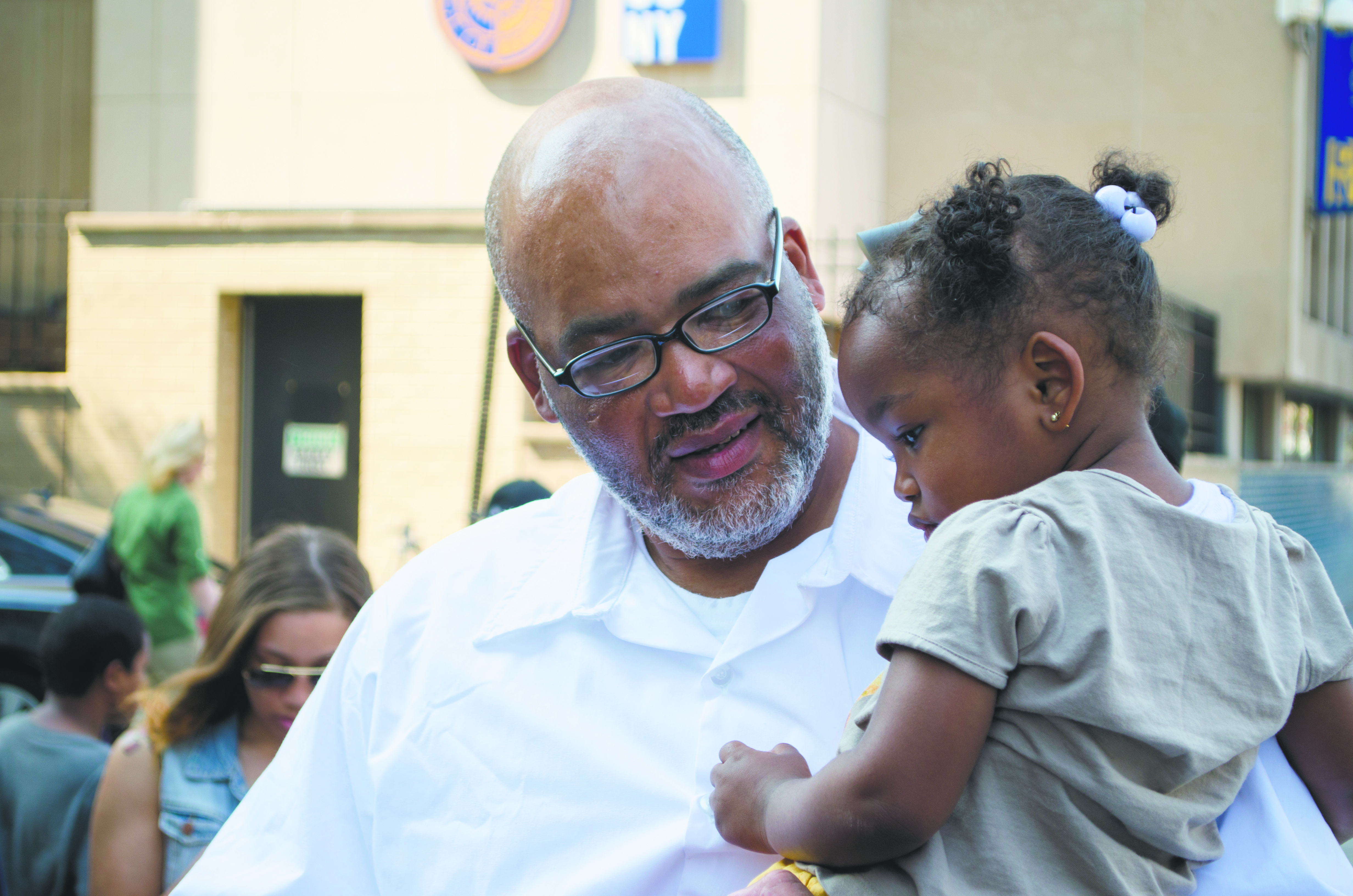 Roger Logan hugs his granddaughter after his release from Prison for a crime he did not commit. (76755)
