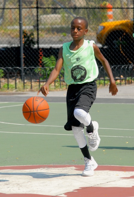 City Wide All-Star li’l guy on a fast run to the hoop. 2014 (91663)