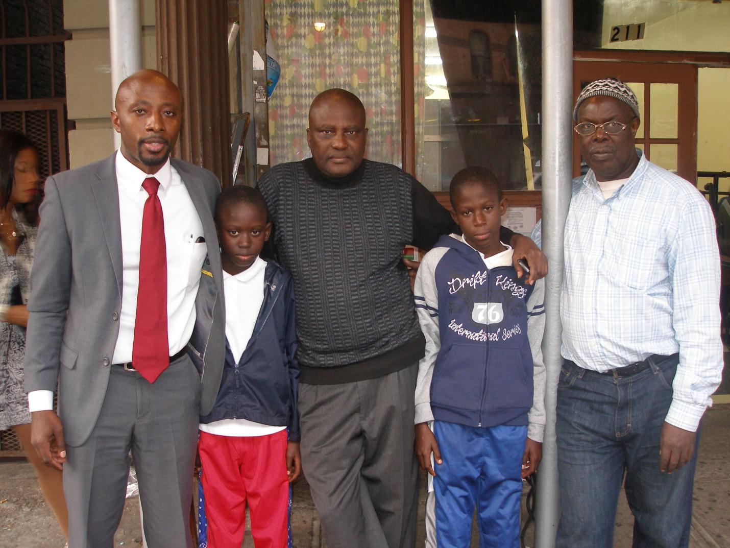 Left to right are attorney Charles Cooper, president of the African Advisory Council of the Bronx, Amadou Drame, Ousmane Drame, Pape Drame and Abdoulaye Thiam (100378)