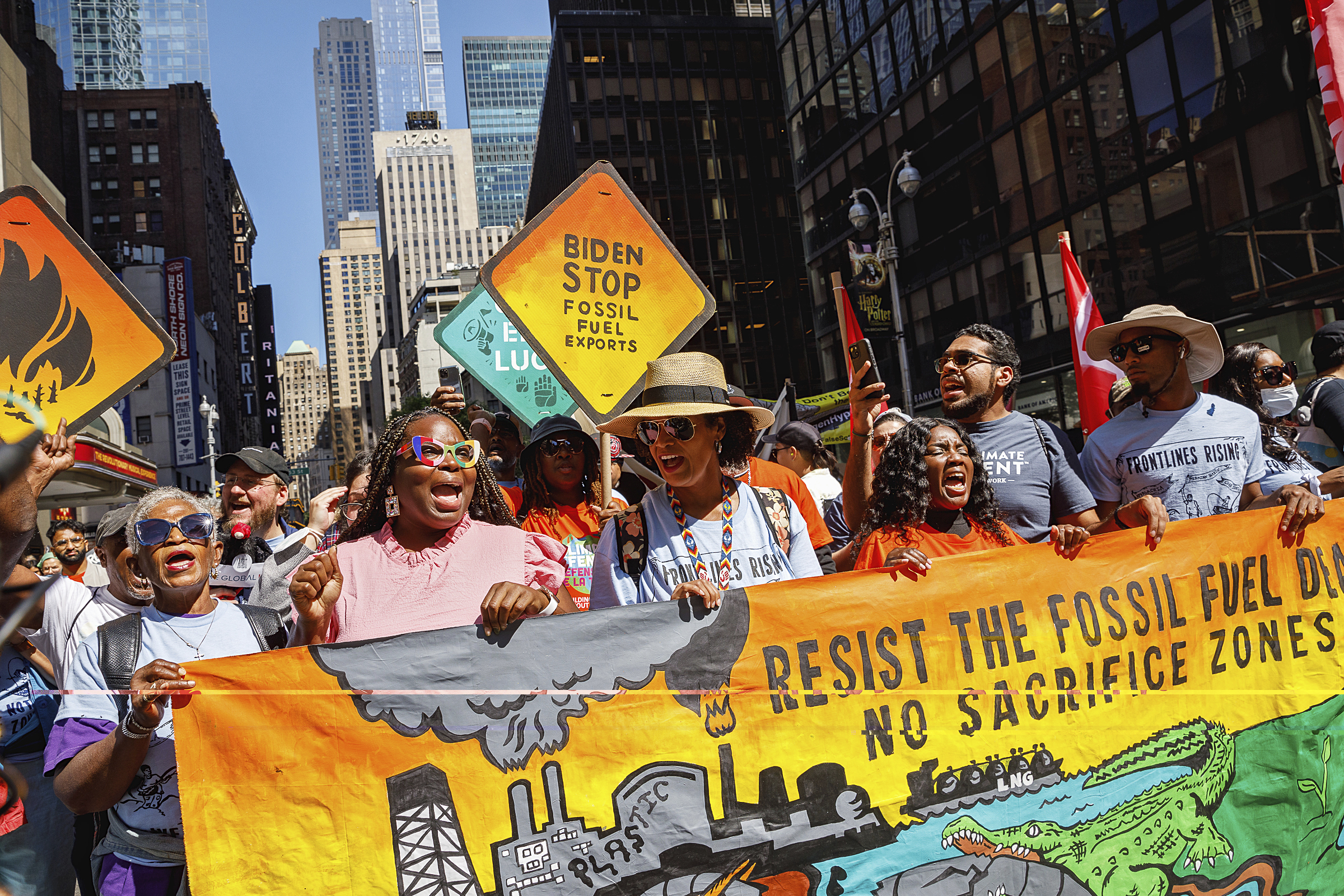 Tens of thousands march to kick off climate summit, demanding end to ...